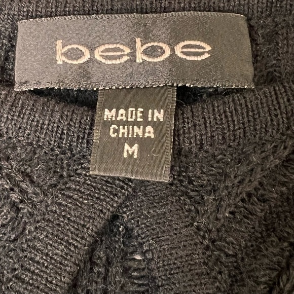 BEBE Black Knit Long Puff Sleeves Front Keyhole Dress LBD Size M - Picture 16 of 16